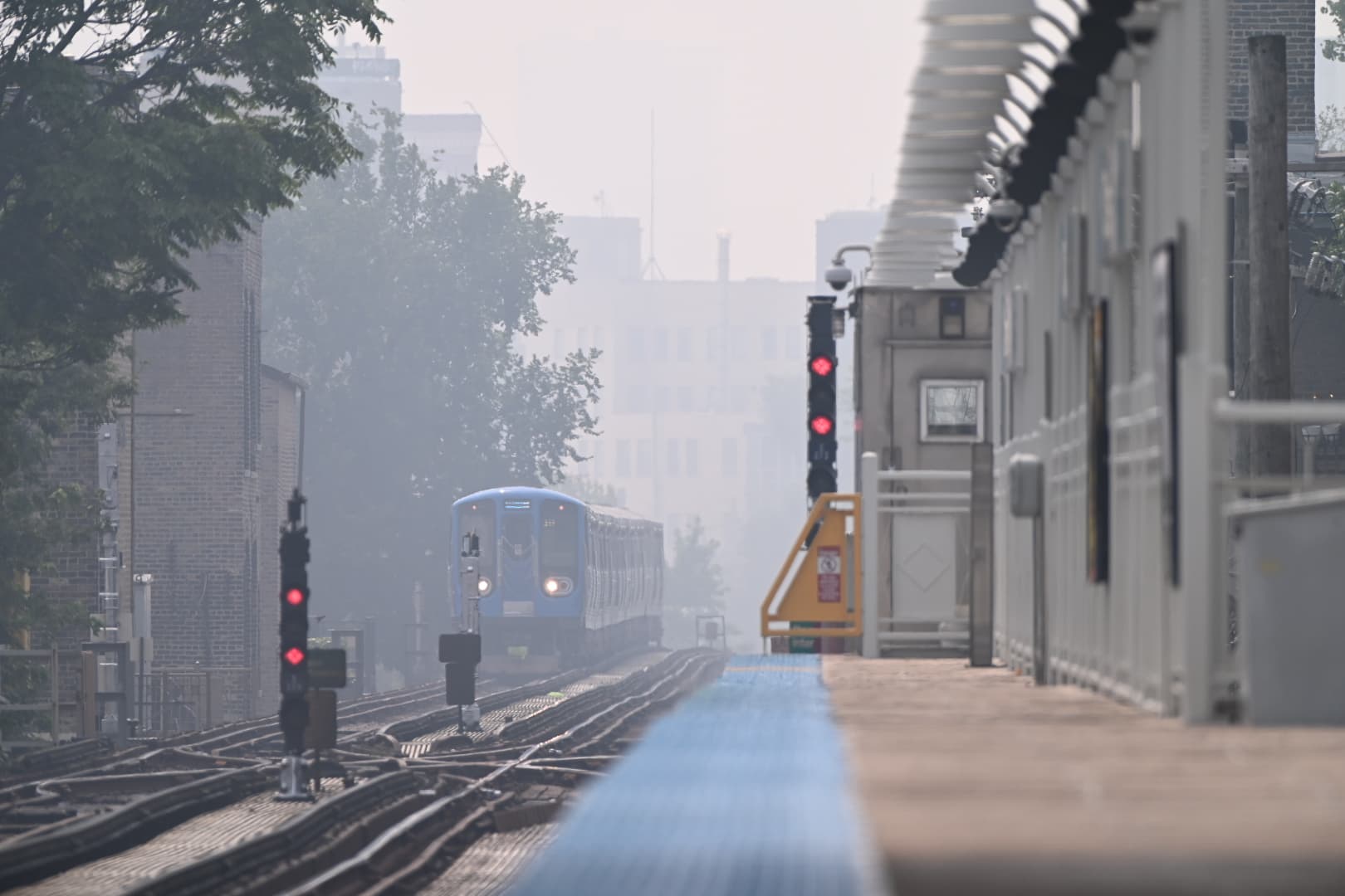 Wildfire Smoke Chokes Chicago With Hazardous Air, Shutting Pools and Canceling Camps