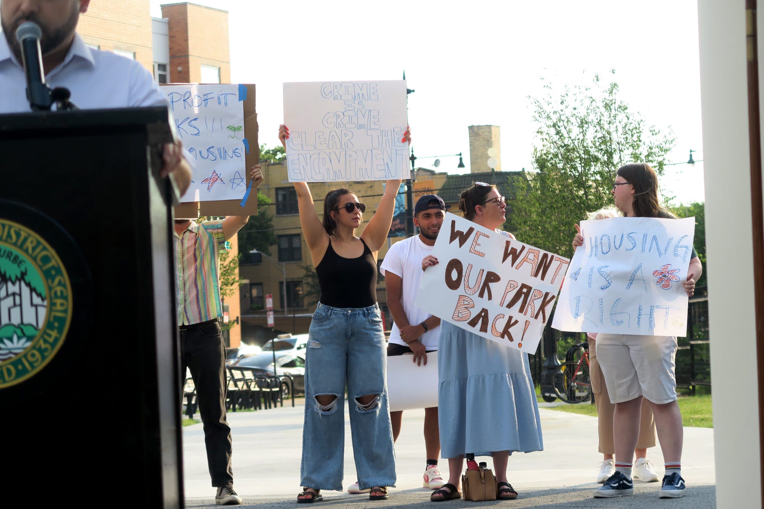 Rival Protests Disrupt Ronan Park Plaza Ribbon-Cutting as Homeless Encampment Dispute Boils Over