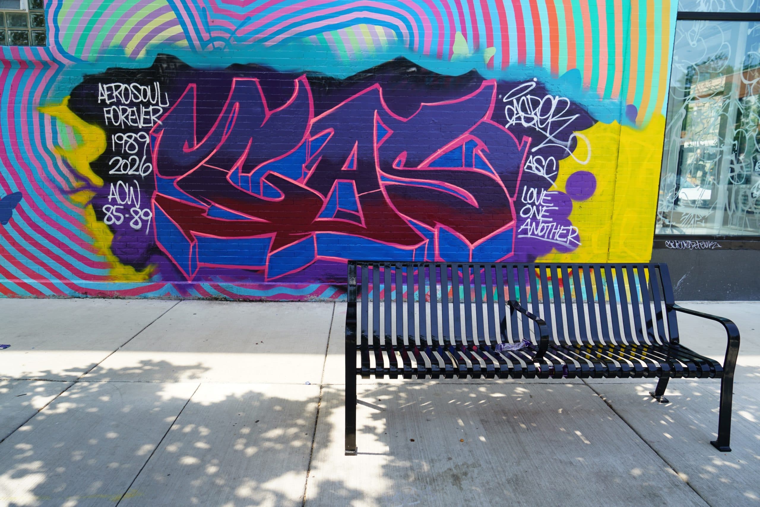 Avondale Artist Reclaims Butterfly Mural After Taggers Destroy It